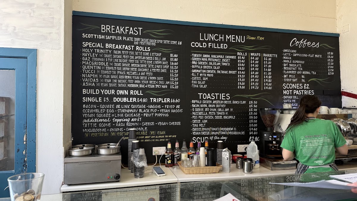 The handwritten menu board above the counter