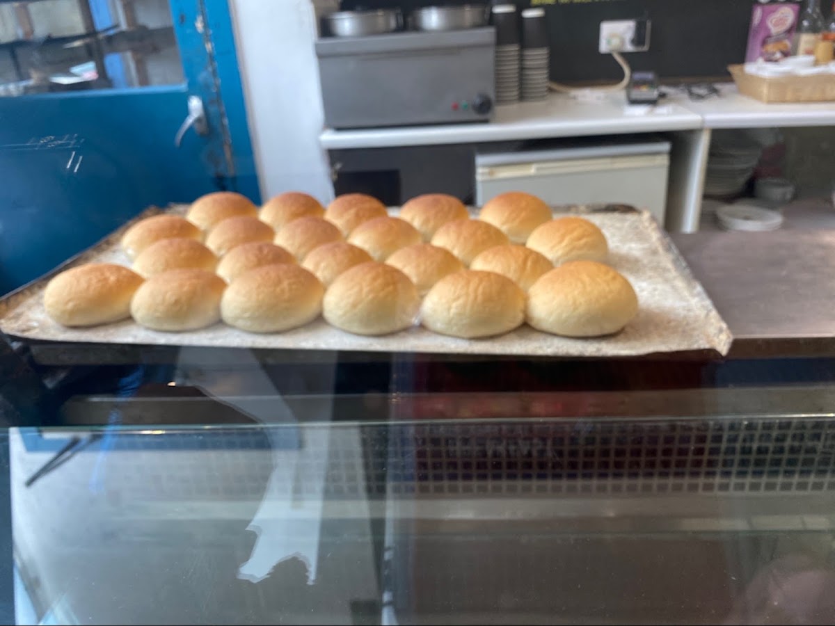 A tray of freshly baked morning rolls on the counter at Preacher's Patisserie